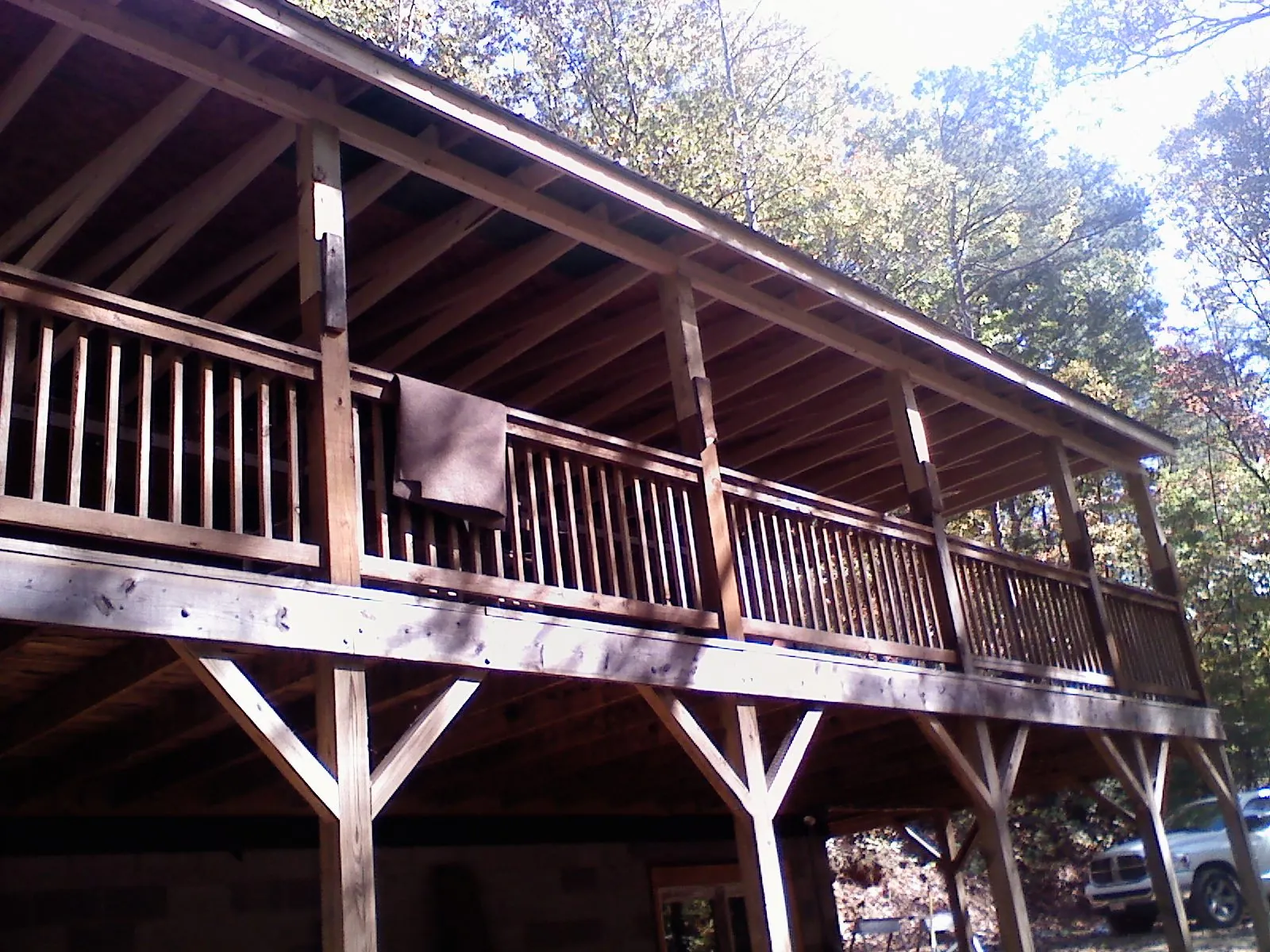 Timber framing under a new elevated porch and deck — Roof Leak Repair in Hickory Flat by Roofing Brothers